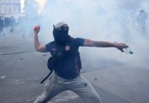 Hundreds arrested as protesters clash with police across France over rising living costs